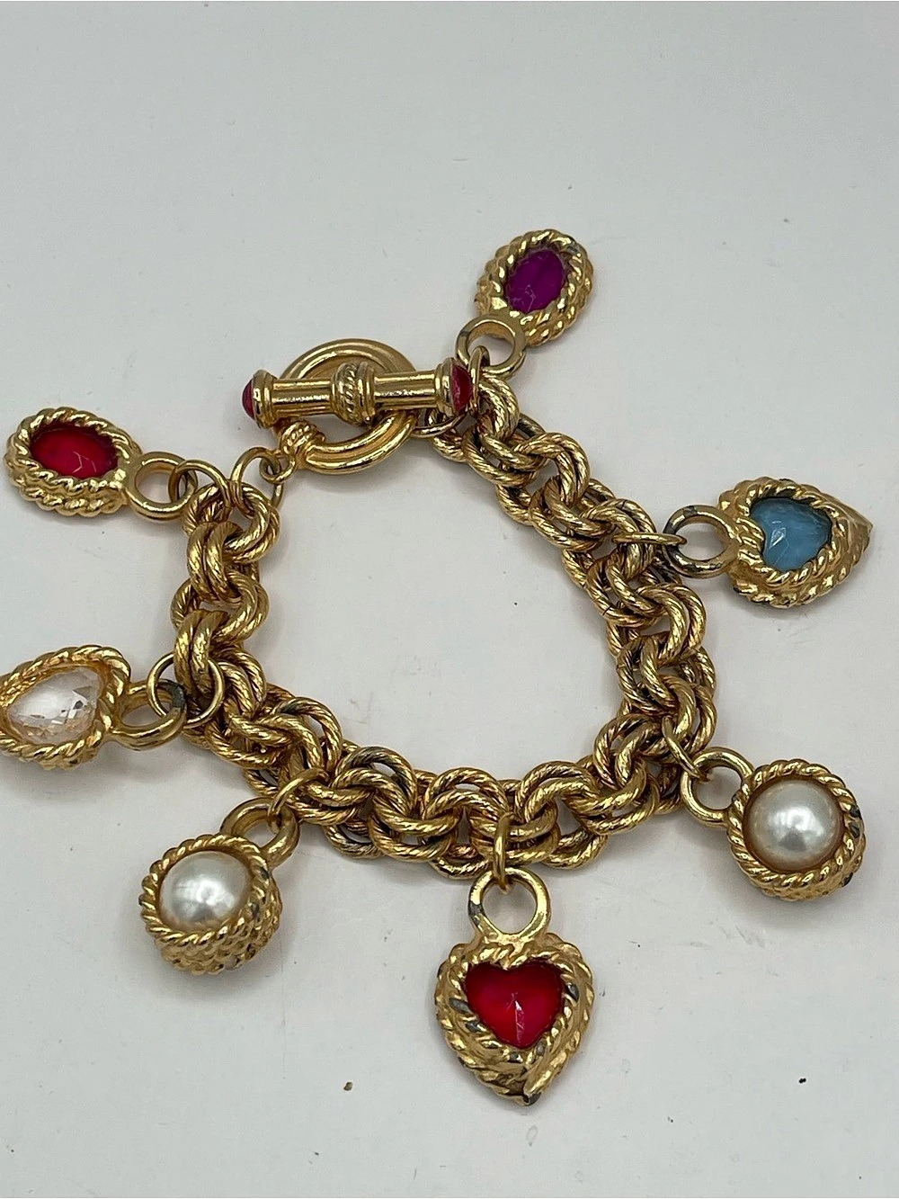 Givenchy vintage 1980s Gripoix charm bracelet makes a statement with its heavy g